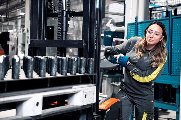 Woman working in manufacturing facility