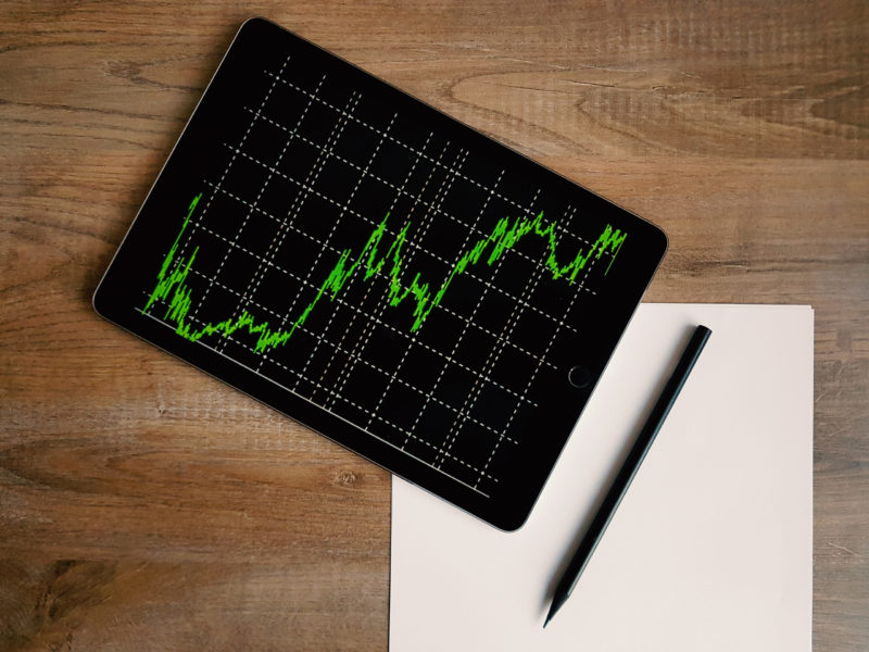 tablet with graph showing pricing fluctuation