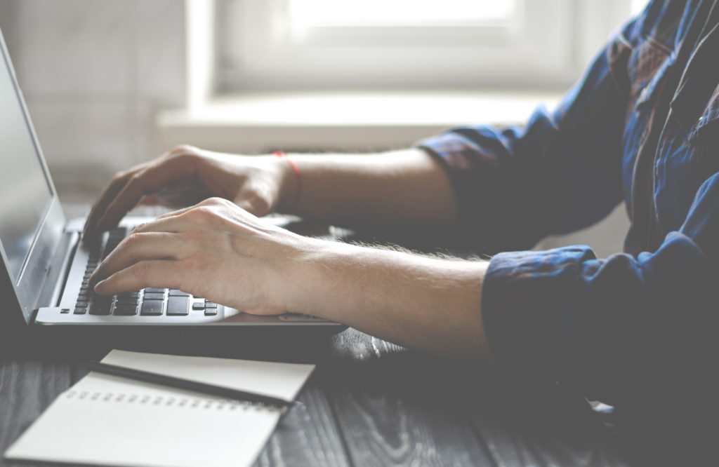 Freelancer works on a laptop in the home office. Business work on laptop