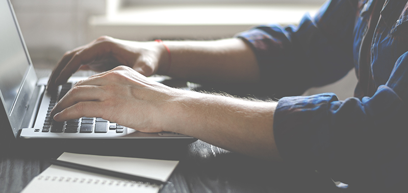 Freelancer works on a laptop in the home office. Business work on laptop