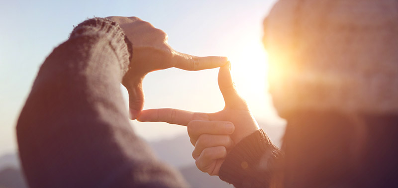 Close up of woman hands making frame gesture for future