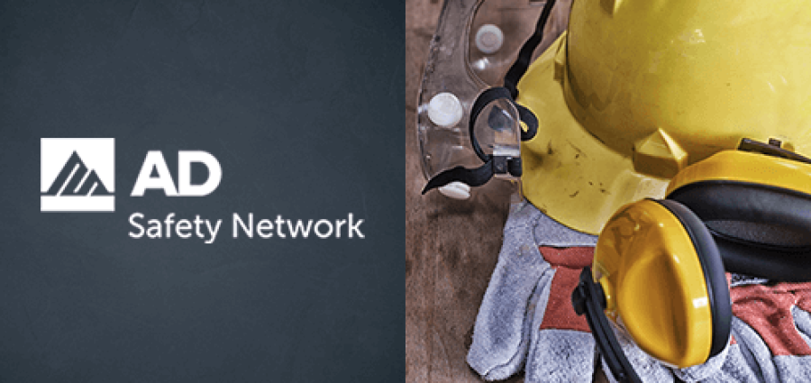 yellow hard hat, gloves, logo for AD and SafetyNetwork