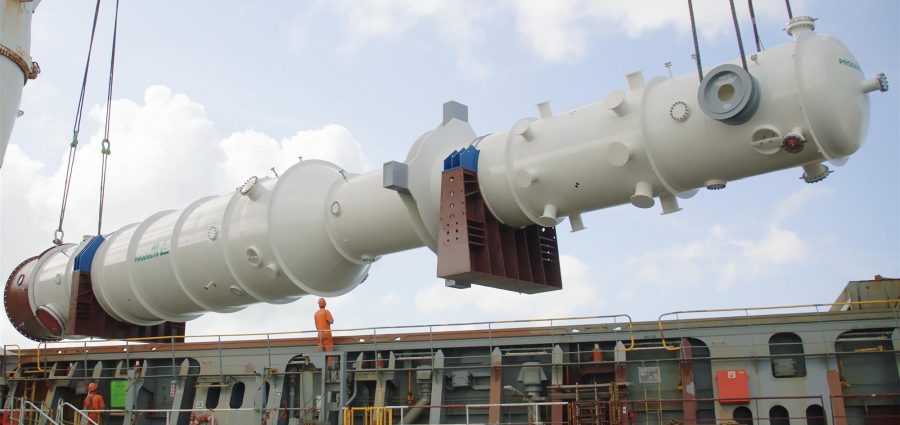 A completed LNG heat exchanger manufactured at Air Products' Port Manatee facility is being loaded on a carrier at the Port of Manatee for shipment to the customer. (Air Products photo)