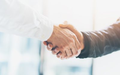 Business partnership meeting. Picture businessmans handshake. Successful businessmen handshaking after good deal. Horizontal, blurred