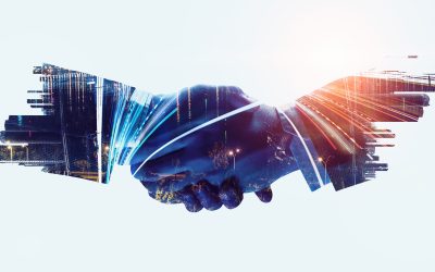 Double exposure of business partners shaking hands and modern cityscape