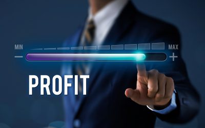 Profit growth, increase profit, raise profit or business growth concept. Businessman is pulling up progress bar with the word PROFIT on dark tone background.