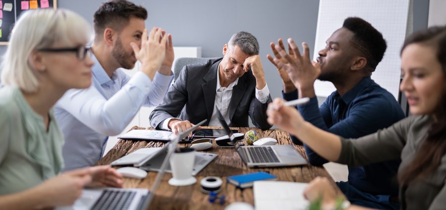 Frustrated Businessman During A Business Meeting In Office