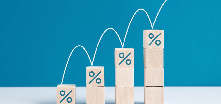 Percentage growth. Increase in financial interest rate, sales increase, mortgage or taxes. percent growth. Wooden stairs with increasing percentage icons.