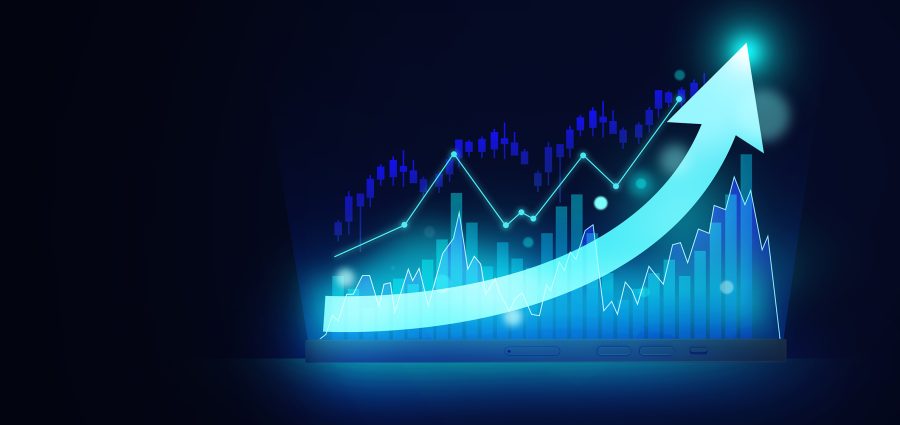 Close up of mobile phone with glowing blue business chart hologram, phone with graph on screen, red arrow and pie charts