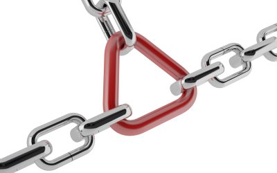 Group of chrome chains with a red link