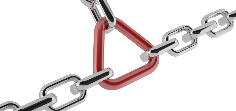 Group of chrome chains with a red link