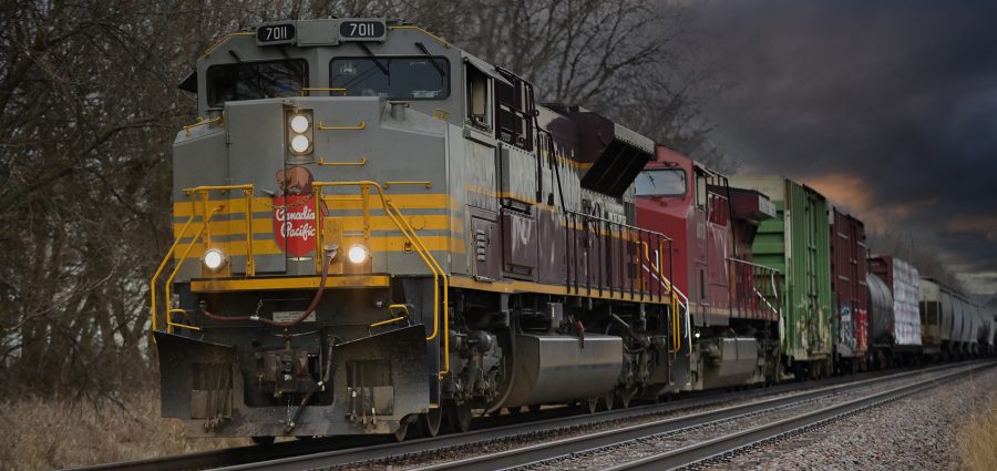 Bartlett, Illinois, USA. A pair of locomotives led by a specially painted Canadian Pacific Railway heritage unit power a freight train through northeastern lllinois destined for Davenport. Iowa. The train had recently departed from the CP freight yard in Bensenville, Illinois, just outside Chicago.