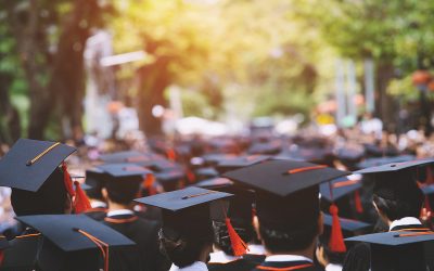 backside graduation hats during commencement success graduates o