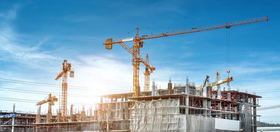 Panorama view at workers are working on large construction sites and many cranes are working in the, Industry new building business.