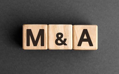 M&A - acronym from wooden blocks with letters, mergers and acquisitions M&A concept,  top view on grey background