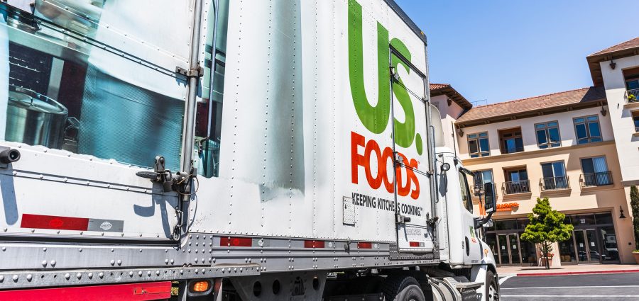 May 5, 2020 Santa Clara / CA / USA - US Foods truck driving on a street in San Francisco bay; US. Foods is an American food-service distributor