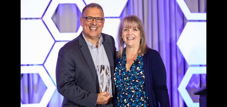 Master Power Transmission Owner Michael Cinquemani (left) with PTDA Executive Vice President and CEO Ann Ardott after Cinquemani received PTDA's Warren Pike Award on Oct. 28 during the PTDA 2022 Industry Summit n Nashville, Tennessee.