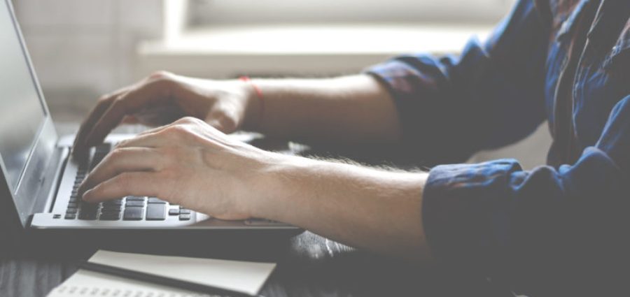 Freelancer works on a laptop in the home office. Business work on laptop