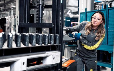 Woman working in manufacturing facility