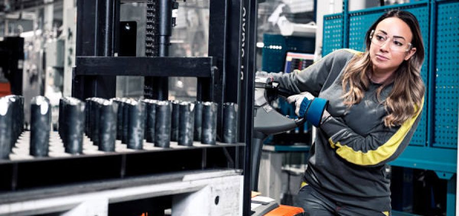 Woman working in manufacturing facility