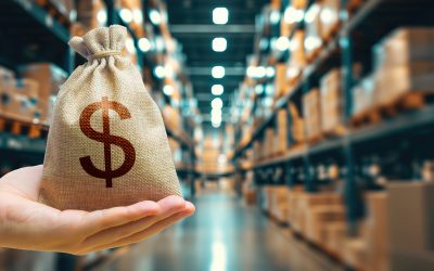 Trade in goods and production. Profit from trading. Import and export. Warehousing logistics. Delivering. Money bag on background of modern distribution warehouse or shipping warehouse. Blurred