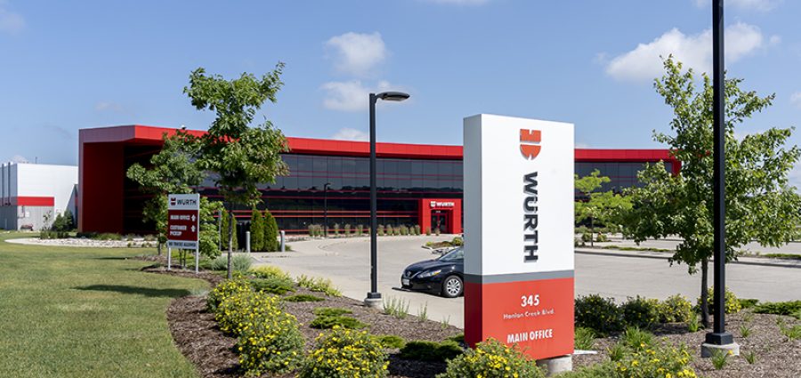 outside photo of Wurth headquarters building sign and black building in background