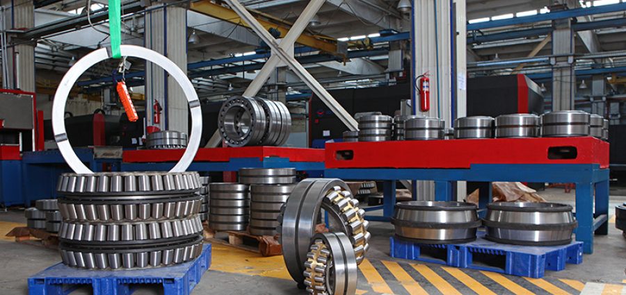 Manufacture of bearings in the factory.The chrome surface of products. Industrial theme. Production of bearings.