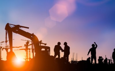 Silhouette of engineer and construction team working at site over blurred background for industry background with Light fair.Create from multiple reference images together