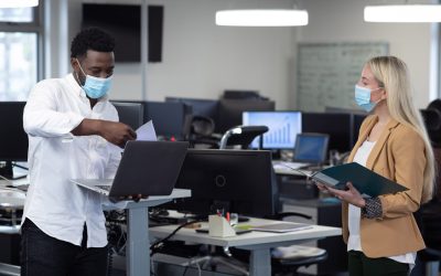 young workers with masks