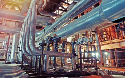 Equipment, cables and piping as found inside of a modern industrial power plant