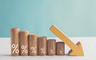 Wooden blocks with percentage sign and down arrow, financial recession crisis, interest rate decline, risk management concept